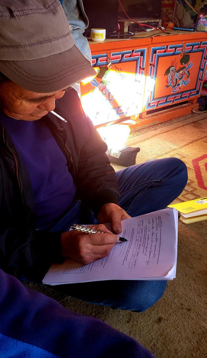 A community member documenting efforts to preserve wildlife corridors in the Altai Mountains of Mongolia.
