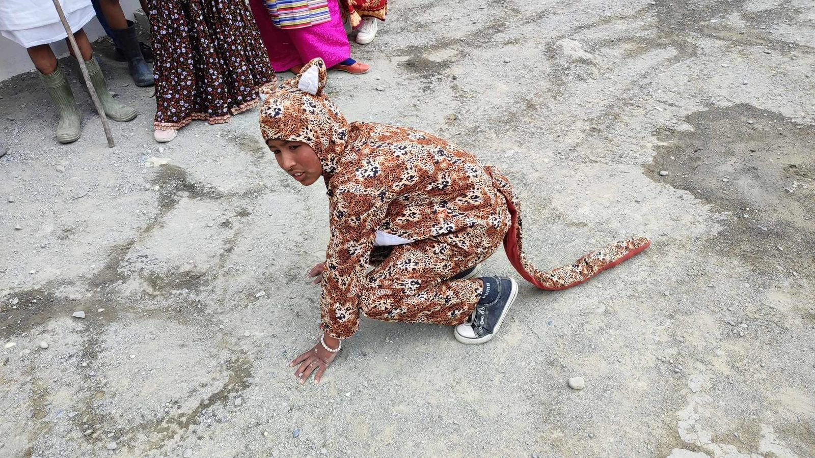 Photo of students performing a street drama to raise awareness about human-wildlife conflict mitigation, promote coexistence with snow leopards, and celebrate them as a culturally important species in the Lower Mustang region of Nepal.