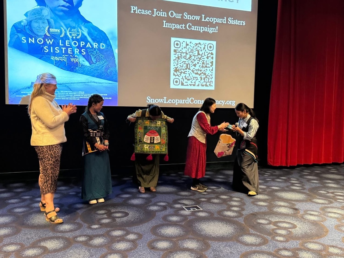 Maria Azhunova presenting at the 25th Anniversary SLC event