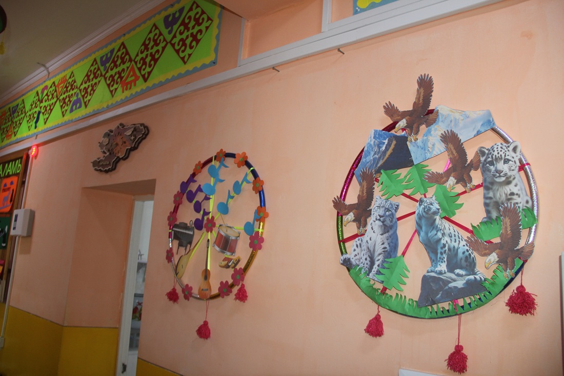 SOS for Snow Leopards Environmental Education Program for kindergartners of Kyrgyzstan classroom Snow Leopard Corner featuring children's crafts