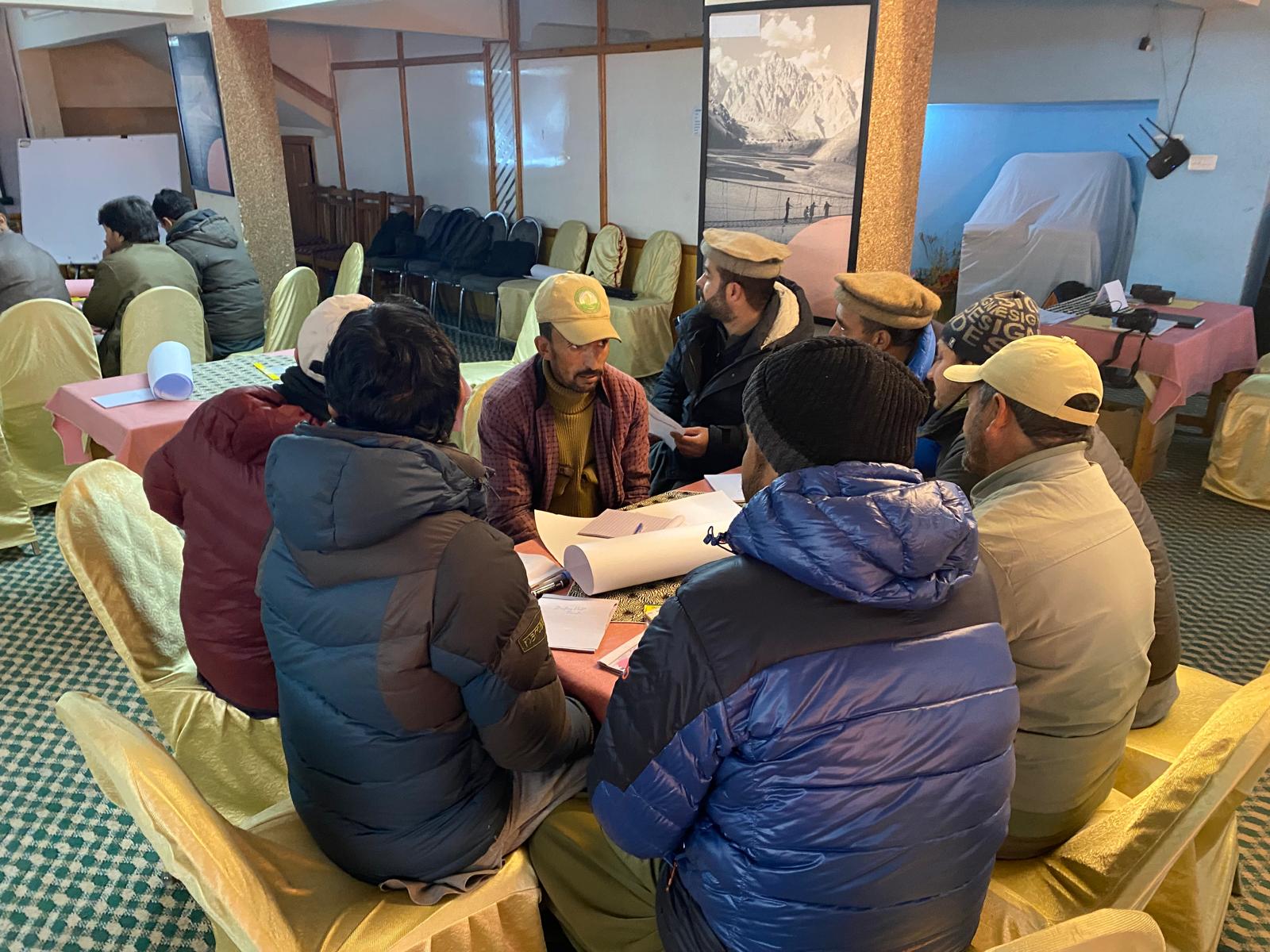 Local conservationists and wildlife field staff participating in a wildlife conservation monitoring training session