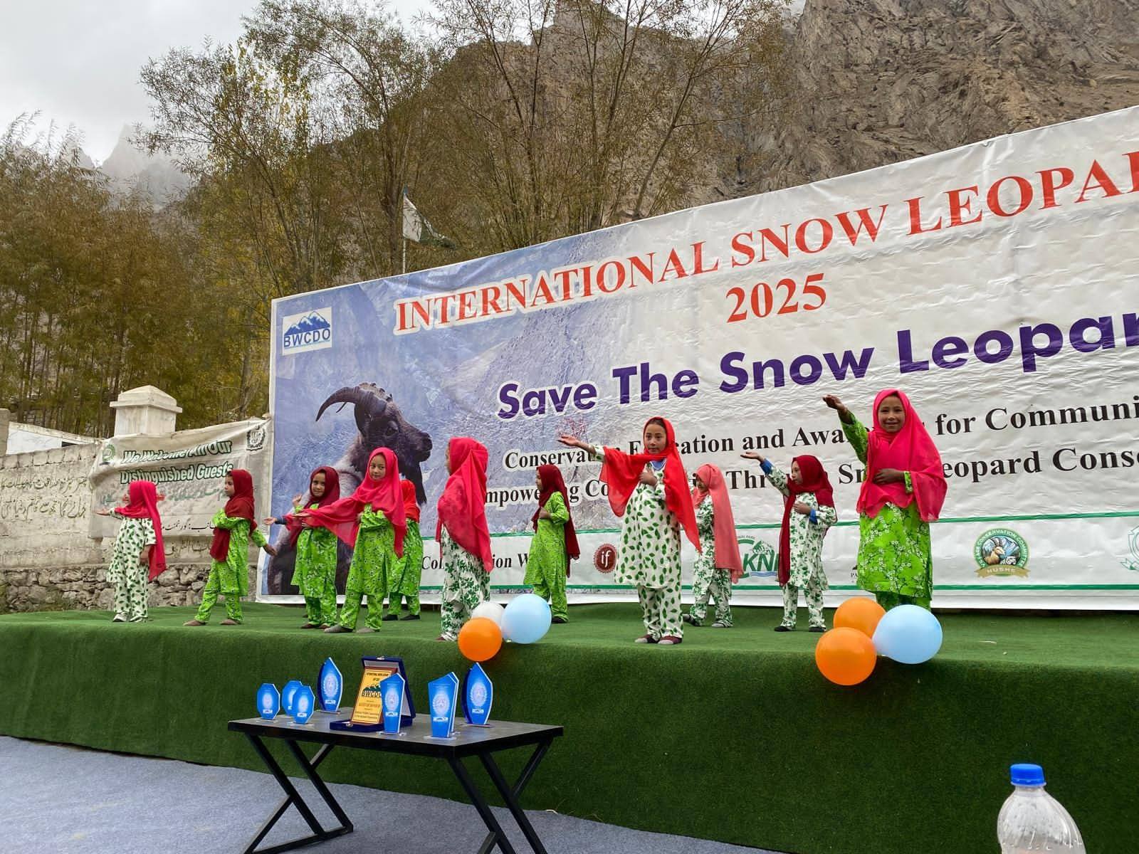 Children perform during Snow Leopard Day festivities in Hushe, Pakistan, sponsored by BWCDO